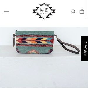 MZ Fairtrade Sun+Sea convertible clutch. Brand new never used!